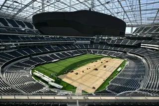 Workers install turf on the pitch at SoFi Stadium in Inglewood, California, ahead of its temporary renaming to Los Angeles Stadium for the World Cup on May 13, 2026. The US Men's National Team will play their first 2026 Fifa World Cup match on June 12 against Paraguay. — AFP pic
