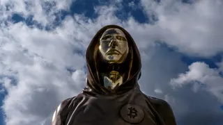 A statue of Satoshi Nakamoto, a presumed pseudonym used by the inventor of Bitcoin, is displayed in Graphisoft Park on September 22, 2021 in Budapest, Hungary.