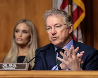 A man gestures while speaking
