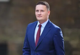 Wes Streeting in a blue suit