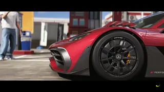 Super close up of the wheel of a Mercedes supercar, red paintwork, carbon detailing, and black rims