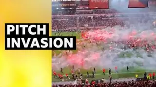 Fans invading the pitch
