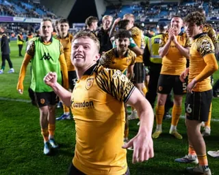Joe Gelhardt of Hull City celebrates victory with his teammates in the playoff semi-final at Millwall