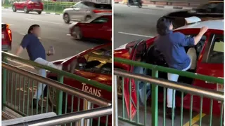 男子牛车水当街狂踹德士 警方：因醉酒闹事被捕