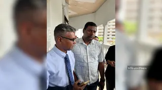 Doraisingam’s nephew, K. Suresh Kumar, and Menagah’s brother A. Nakulen, 49.-NSTP/Rahmat Khairulrijal.