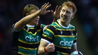 George Hendy in a Saints shirt with a clenched fist