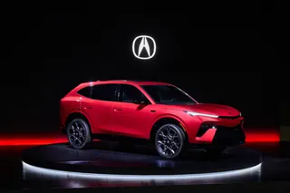 A red acura prototype SUV