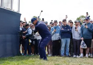 Bryson DeChambeau hits out of the rough