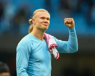 The Norwegian footballer Erling Haaland fist-pumps after playing Brentford.