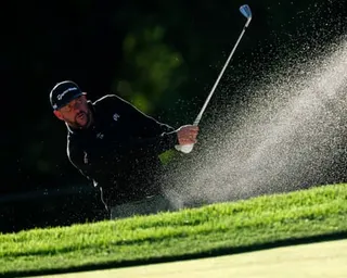 Michael Block plays a shot from a bunker on the fourth hole during the second round of the PGA Championship