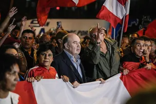 Far-right candidate Rafael Lopez Aliaga (centre) takes part in a rally in Lima, Peru, on Thursday. Photo: EPA