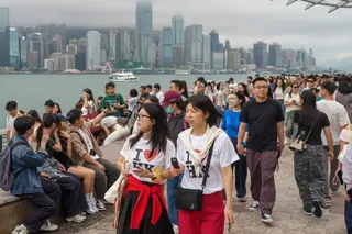 Tourists at the Tsim Sha Tsui waterfront during the Easter holiday in April. Photo: Eugene Lee