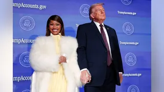 U.S. President Donald Trump and musician Nicki Minaj holding hands onstage