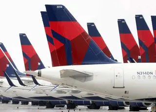 Delta Air Lines planes sit idle at Kansas City International Airport.