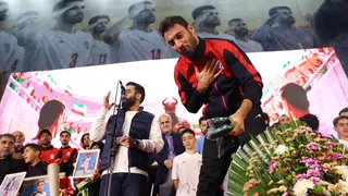 A member of Iran's national soccer team attends a farewell ceremony ahead of their departure to the 2026 World Cup in Tehran, Iran, May 13, 2026. Majid Asgaripour/WANA (West Asia News Agency) via REUTERS.