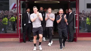 Hearts captain Lawrence Shankland and head coach Derek McInnes greet the fans