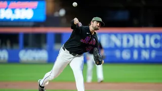 New York Mets pitcher Clay Holmes throwing a pitch during a baseball game
