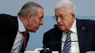 Reuters Palestinian Authority Vice-President Hussein al-Sheikh on the left, speaking to Palestinian Authority President Mahmoud Abbas (14/05/26)