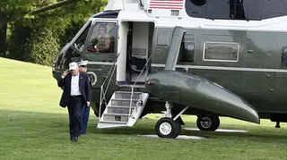 Trump returns from China trip praising 'historic moment'