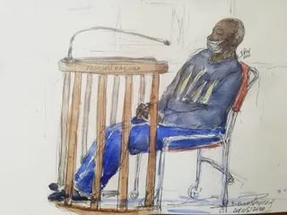 Felicien Kabuga wears a face mask as he appears at the Paris Court of Appeal in May 2020, during the coronavirus pandemic. Courtroom sketch: Benoit Peyrucq via AFP