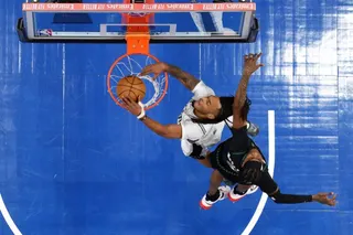 MINNEAPOLIS, MINNESOTA - MAY 15: Stephon Castle #5 of the San Antonio Spurs dunks the ball against Jaden McDaniels #3 of the Minnesota Timberwolves in the first quarter in Game Six of the Second Round of the NBA Western Conference Playoffs at Target Center on May 15, 2026 in Minneapolis, Minnesota. NOTE TO USER: User expressly acknowledges and agrees that, by downloading and or using this photograph, User is consenting to the terms and conditions of the Getty Images License Agreement. David Berd