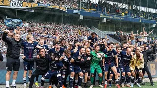 Aarhus GF players celebrate in front of their fans after clinching the Danish league title in 2026