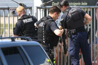 Heavily armed police officers on the scene in an industrial park in Schkeuditz, near the city of Leipzig, Germany on Sunday. Photo: EHL Media / dpa