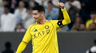 Cristiano Ronaldo gives a thumbs-up sign after scoring for Al-Nassr