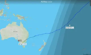 A map shows the route of Qantas QF21