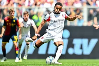 Christopher Nkunku’s penalty puts Milan ahead.