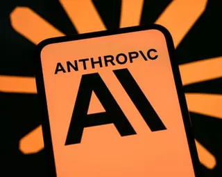 The Anthropic logo is displayed on a smartphone screen with the Claude logo in the background