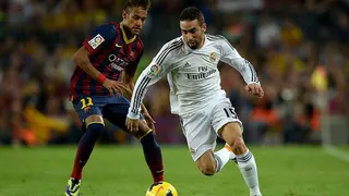 Dani Carvajal dribbles past Barcelona's Neymar during a game in October 2013