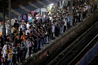 Commuters crowd on a train platform in Mumbai. The UN projects India’s population will keep rising for ‌about four decades, peaking at around 1.7 billion. Photo: Reuters