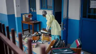 Getty Images Staff members at CBCA Virunga Hospital prepare rooms intended for possible suspected Ebola cases following official announcements in Goma