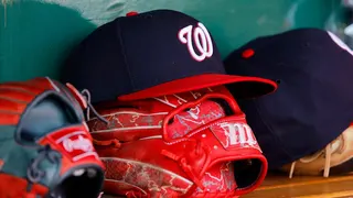 A New Era Washington Nationals baseball hat on a surface at PNC Park.