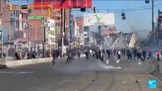 Bolivian police clash with protesters blocking roads into La Paz