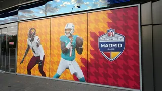 Washington Commanders linebacker Frankie Luvu and Miami Dolphins quarterback Tua Tagovailoa graphic at Santiago Bernabeu Stadium