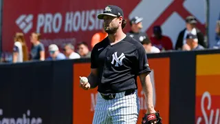 gerrit cole tossing a baseball