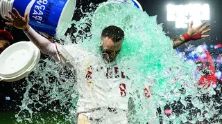 Los Angeles Angels' Zach Neto celebrating after hitting a walkoff home run.