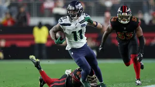 Jaxon Smith-Njigba running with football during NFL game at Levi's Stadium