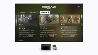 The Apple TV interface shows a menu for the show “Prehistoric Planet: Ice Age” with a larger text size.