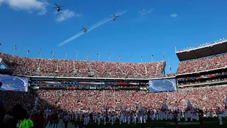 Flyover of military aircraft above Bryant Denny Stadium in Tuscaloosa, Alabama
