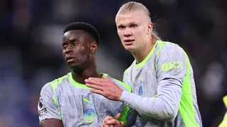 Manchester City's Marc Guehi with Erling Haaland