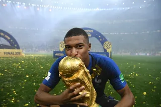 This file picture shows France forward Kylian Mbappe kissing the Fifa World Cup trophy after France defeated Croatia in the 2018 final at the Luzhniki Stadium in Moscow, July 15, 2018. — AFP pic