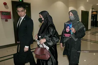 Nur Shira Abdullah (centre) said her sister-in-law had told her privately in a hospital ward when there were no visitors present. NSTP/MOHD ADAM ARININ
