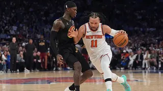 Jalen Brunson dribbles