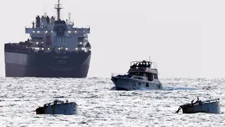 Israeli forces are seen near a vessel associated with the Global Sumud flotilla off the coast near Ashdod, Israel.