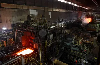 A production line at a Nippon Steel plate rolling mill in Kimitsu, Chiba Prefecture, in May 2025.