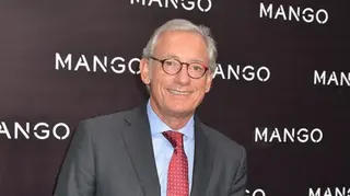 Foc Kan/WireImage A 2011 pic of a Isak Andic, with grey hair and a red tie and suit