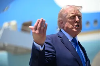 US President Donald Trump speaks to the press before boarding Air Force One at the Palm Beach International Airport in April. Photo: AFP